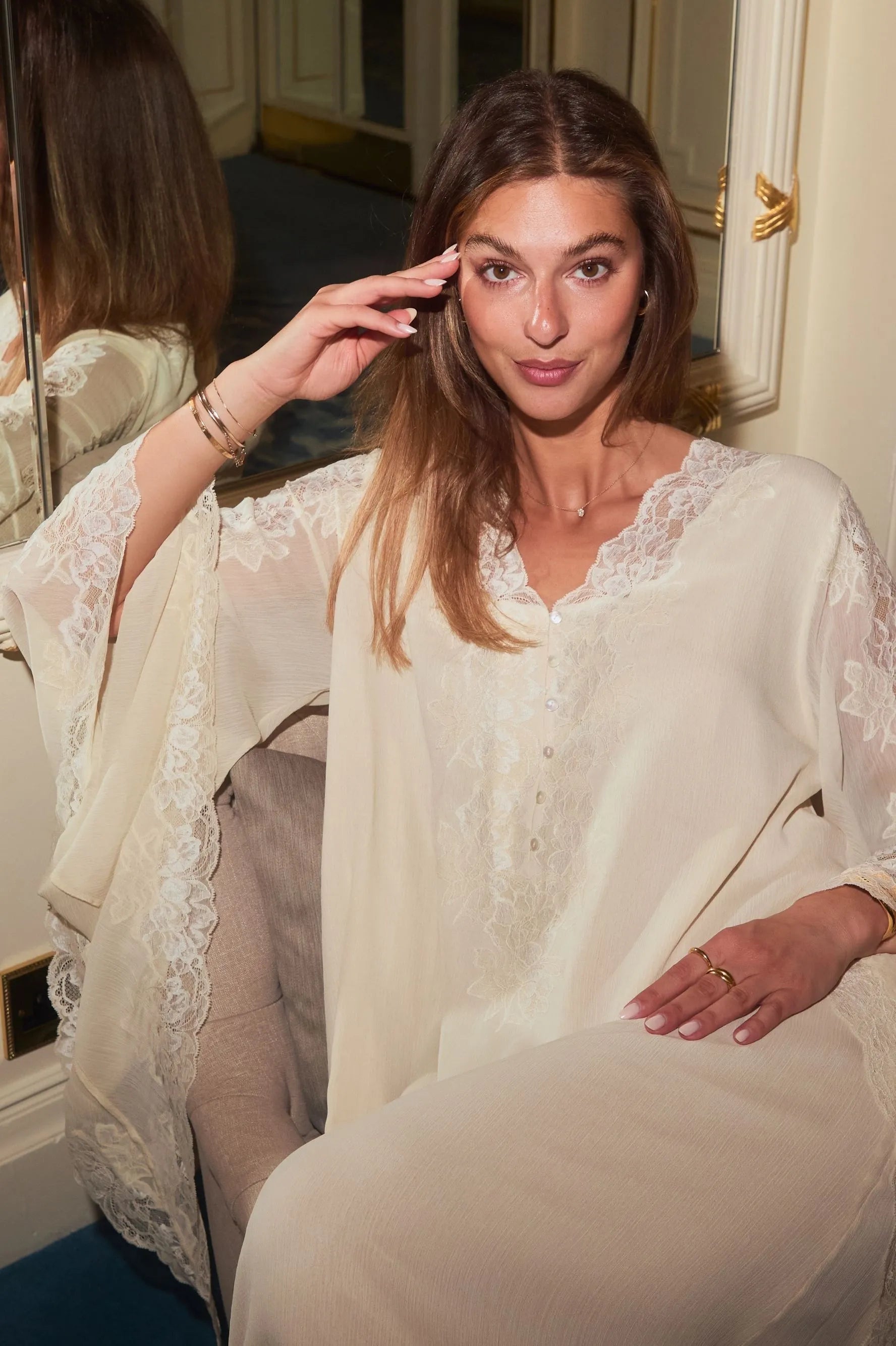 Model wearing Miel Gold Silky Chiffon Dress with a soft, radiant finish