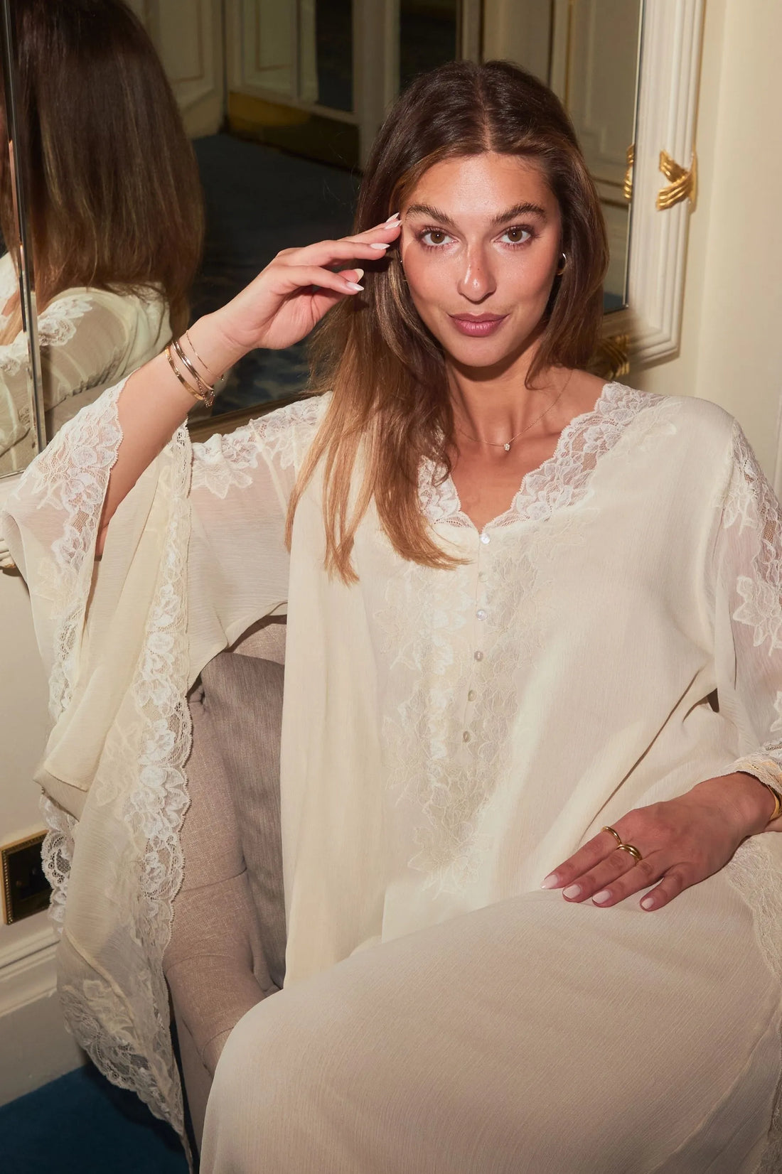 Model wearing Miel Gold Silky Chiffon Dress with a soft, radiant finish