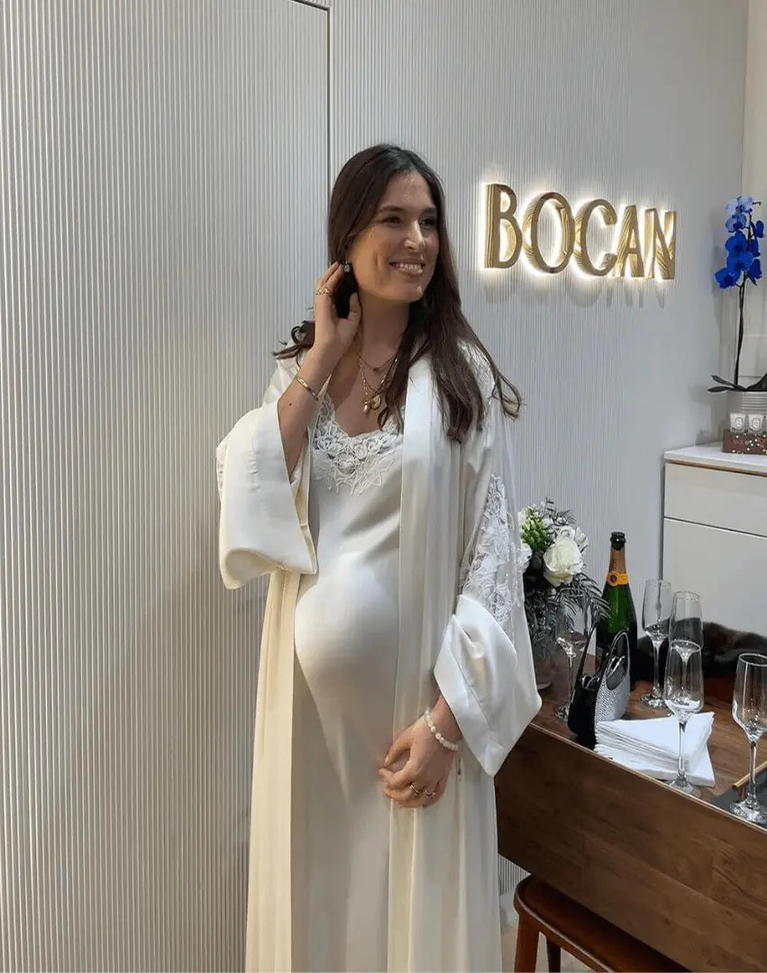 baby bump growing in my Bocan silk dress