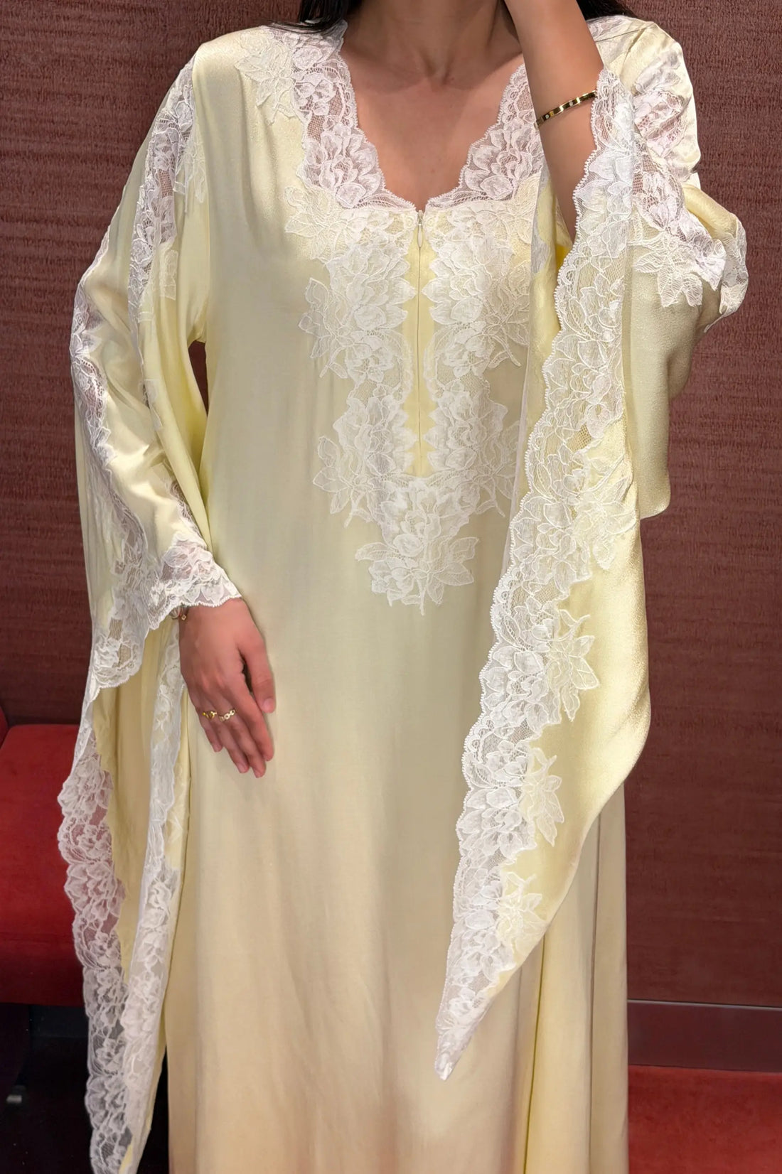 Adelaide silky rayon maternity dress in butter yellow, detail of front button fastening