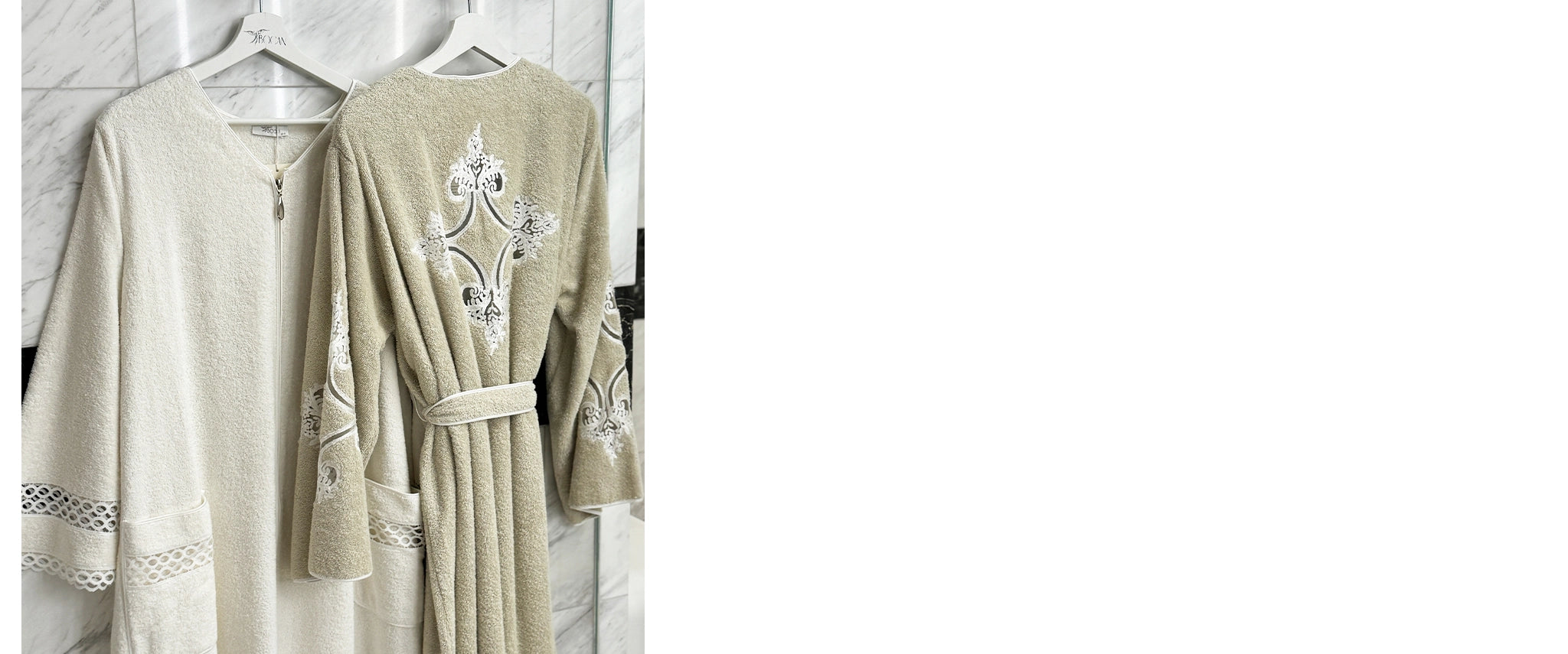 A plush, soft cotton bathrobe in a neutral color, hanging on a hook in a spa-like bathroom.