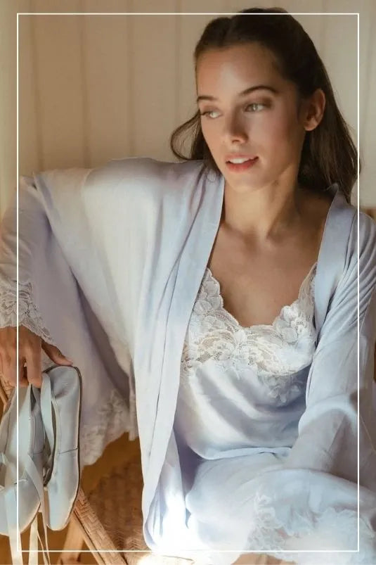 Elegant bridal nightwear set featuring satin robe and lace gown perfect for wedding night and honeymoon